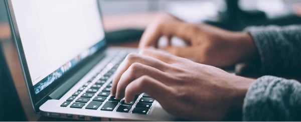 typing on a laptop